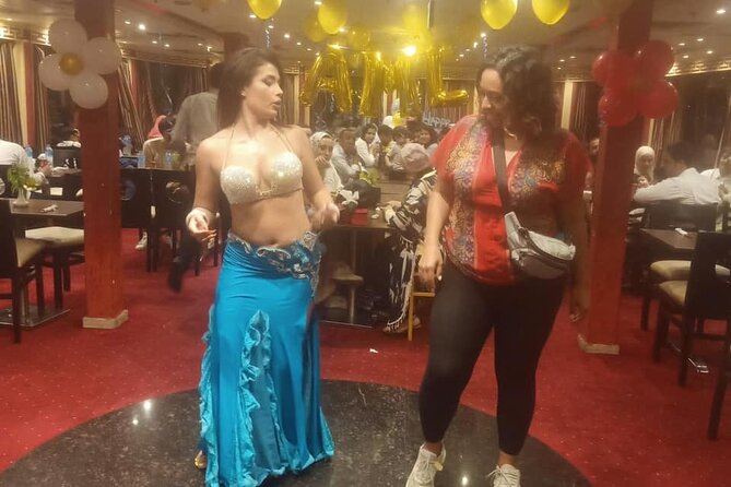2-hours night dinner cruise show : Eat , Dance and Sing - Tanoura, belly dancing, and Egyptian songs