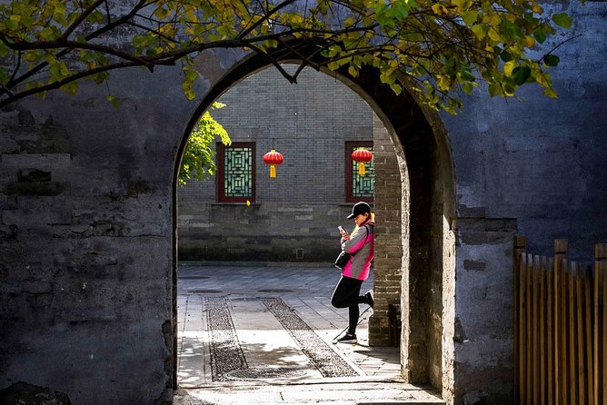3-Hour Private Hutong Walking Tour with Drum Show at Drum Tower and Tea Tasting - A short stop at Yinding Bridge