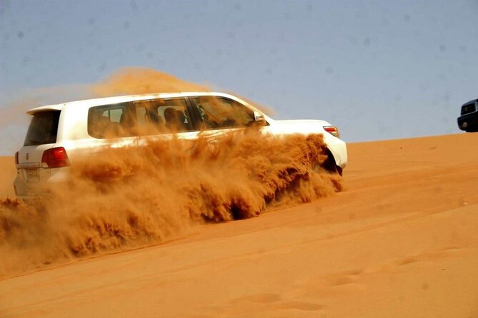 6 Hour Thrilling Desert Safari in 4x4 with Entertainment Show - Sandboarding for a quick second thrill
