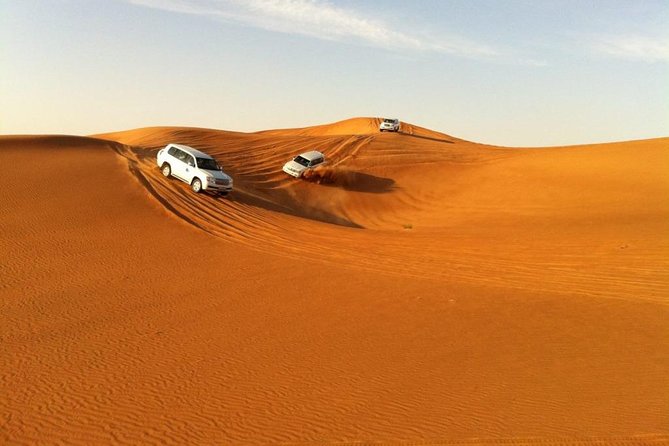 Abu Dhabi 4x4 Desert Safari BBQ Dinner , Camel Ride , Belly Dance - Leaving Abu Dhabi for the Al Khatim Desert