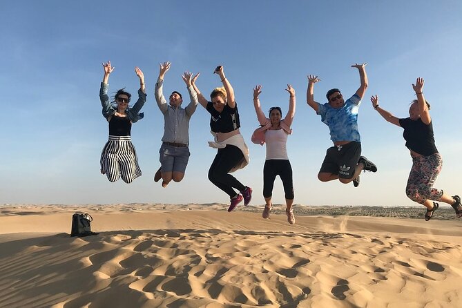 Abu Dhabi Desert Safari with BBQ Dinner & Shows - Sunset turns the desert into the evening’s best view