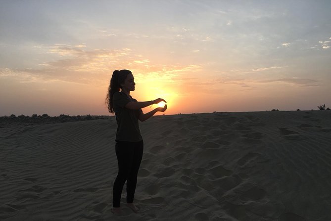 Adventure Night With Cultural Show - The camel ride carries you toward sunset