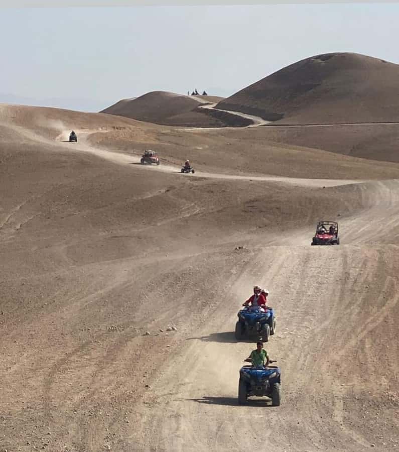 Agafay Tour: Sunset, Dinner, Camel ride, Quad and fire show - Dinner, music, and the fire show