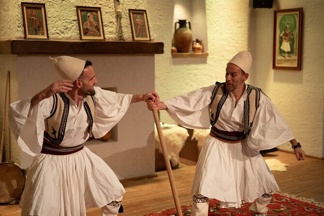 Albanian Night Show: Traditional Music, Dance & Dinner in Tirana - The opening: clothes, raki, and a friendly welcome