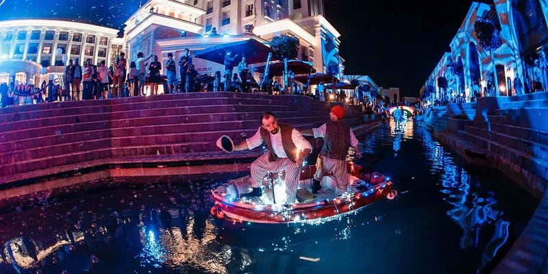 Antalya Land of Legends Night Show & Transfers - The illuminated boat parade on the park river