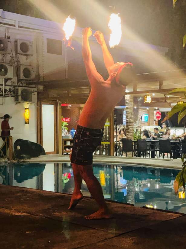 Borocay: Fire Dancing Show at Red Coconut Beach Hotel - Fire spinning in a 15-minute beachfront burst