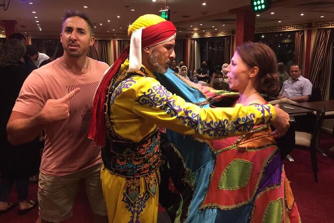 Cairo Dinner Cruise in Nile River With Belly Dancer & Tanora show - Belly dancing, live music, and the Tanoura show