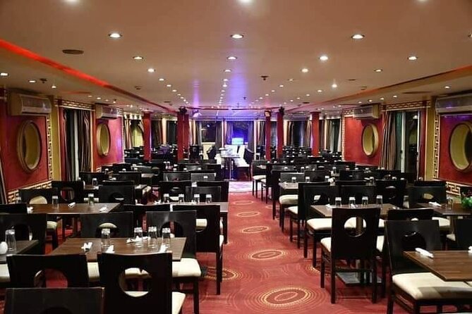 Cairo dinner cruise In Nile River with Belly Dancing and Transpor - Boarding the boat and finding your seat