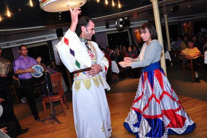 Cairo Dinner Cruise show with belly dancer show on Nile river - Belly dancing, tanoura, and folk music