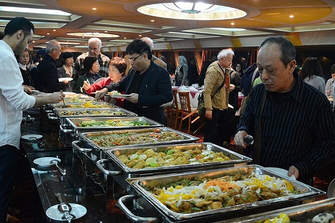 Cairo: Nile Dinner Cruise with Show & Shared Transfer - Folkloric music and belly dancing onboard