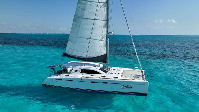 Cancun: Isla Mujeres Catamaran + Coco Bongo Show - Pickup and the first trip to El Meco