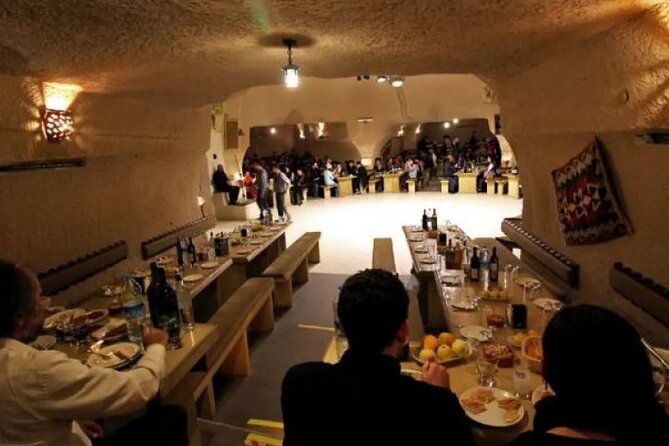 Cappadocia Turkish Night Show with Dinner - The cave stage and seating arrangement