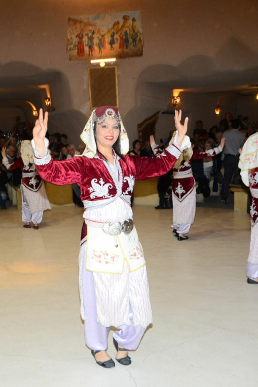 Cappadocia: Turkish Night Show with Dinner in a Cave - Entering a Cappadocia cave restaurant after dark