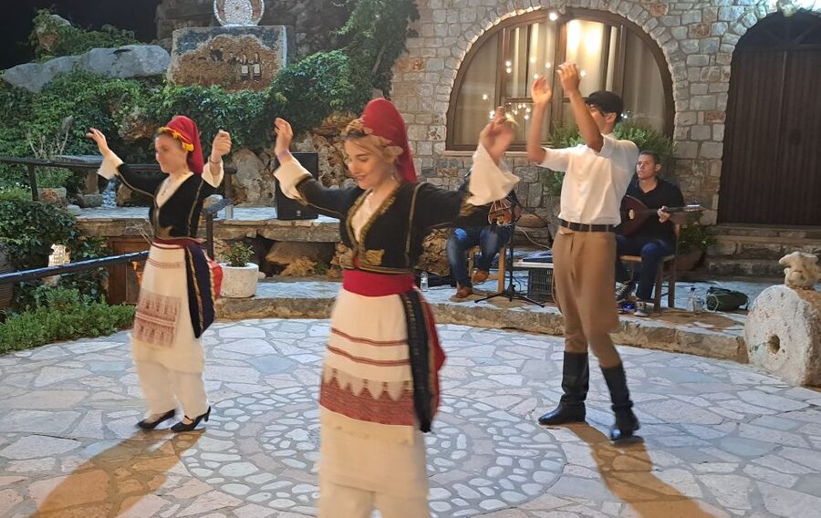 Chania: Cretan Folklore Dance Show with Dinner - From pickup to Stalos in about 30 minutes