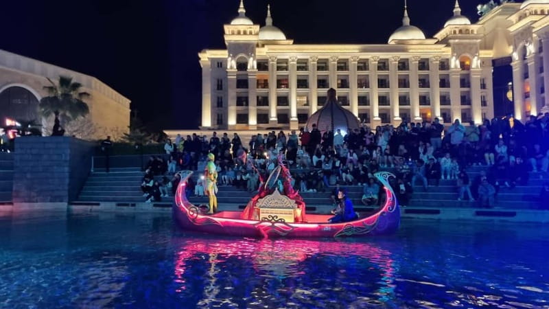 City of Belek: The Land of Legends Night Show - The canal opening: boats, music, and bright water