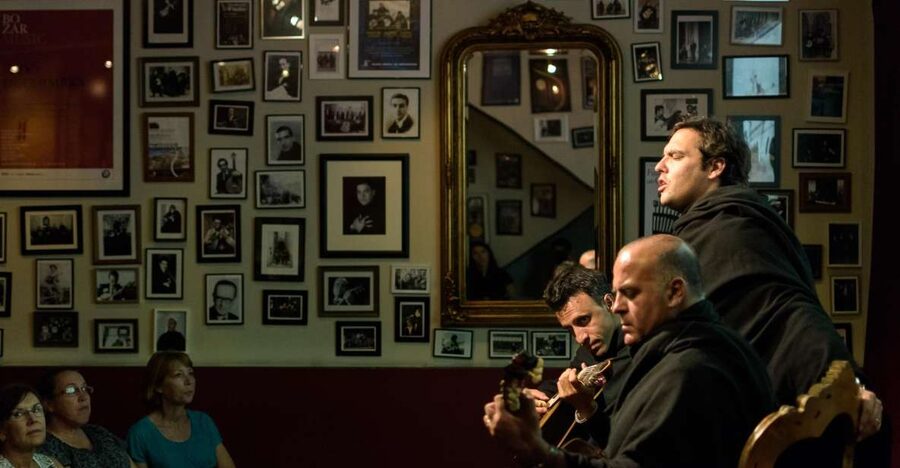 Coimbra: Live Fado Show with Glass of Port Wine - Singers, Guitarists, and a Living Tradition
