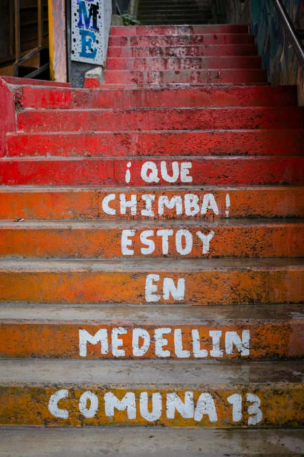 Comuna 13: Graffiti Tour with Tasting, Live Show, & Gallery - Walking through the Graffitour