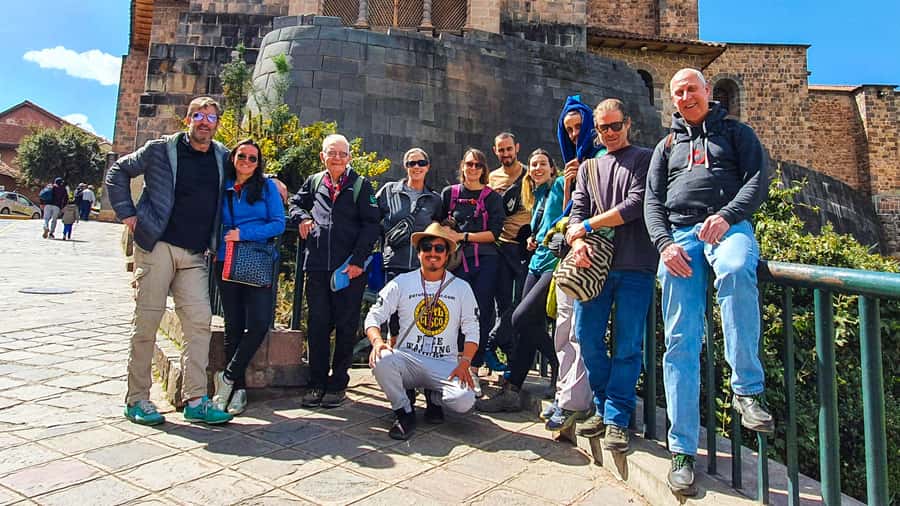 Cusco: Historic Walking Tour with Pisco Sour and Music Show - Walking uphill into San Blas