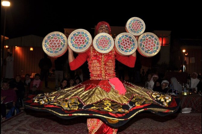 Desert Safari with BBQ Dinner, Camel Ride, Sand Board & Live Show - Reaching the Dubai Leisure Desert Camp