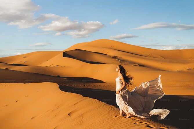 Desert Safari with BBQ Dinner, Camel Ride, Sand Board & Live Show - Tea, drinks, and the BBQ buffet
