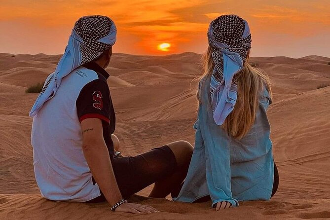 Desert Safari with BBQ Dinner, Camel Ride, Sand Board & Live Show - Belly dance, fire, and tanura shows