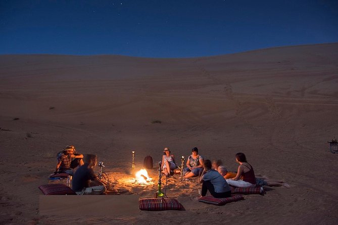 Dinner in Dubai Desert with Camel Ride, BBQ Dinner and Belly Dance - A traditional camp welcome with tea and Arabic coffee