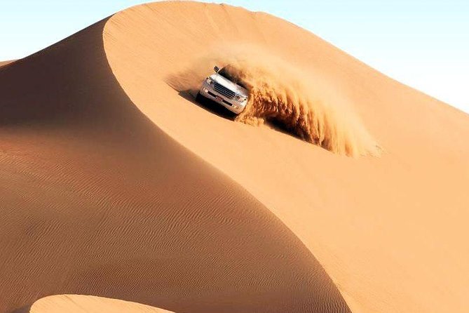 Dubai Desert Safari-BBQ Dinner, Belly Dance, Fire show - Arabic clothing, shisha, and the camp atmosphere
