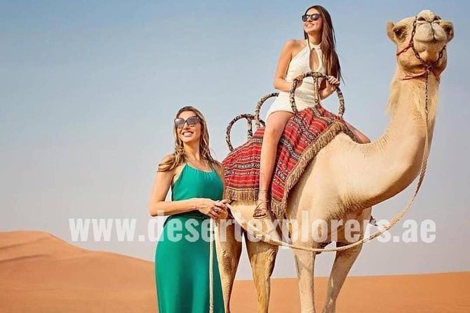 Dubai Desert Safari with Quad Bike, sandboarding, live show & BBQ - A short camel ride and a traditional camp welcome