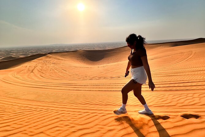 Dubai Evening Desert Safari with Dinner, Camel Ride and Show - Pickup, group size, and timing
