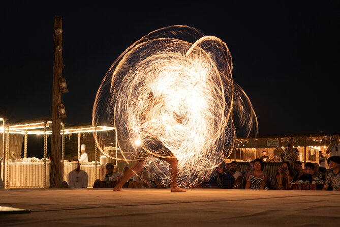 Dubai Evening Desert Safari with RedDune, sandboarding, live show - The red-dune start gives the safari its character