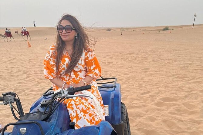Dubai Evening Safari With Quad Biking VIP BBQ 10 Show Camel Ride - Quad biking across the desert for 30 minutes