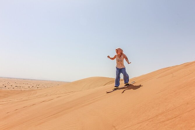 Dubai Experience: Quad bike, BBQ Dinner and Live Show - Belly dancing, Tanura, and the fire show