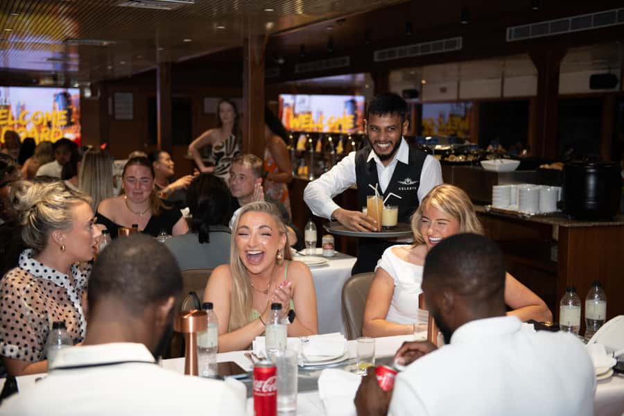 Dubai Marina: Luxury Dinner Cruise, Live Show, Open Bar & DJ - Boarding the modern catamaran