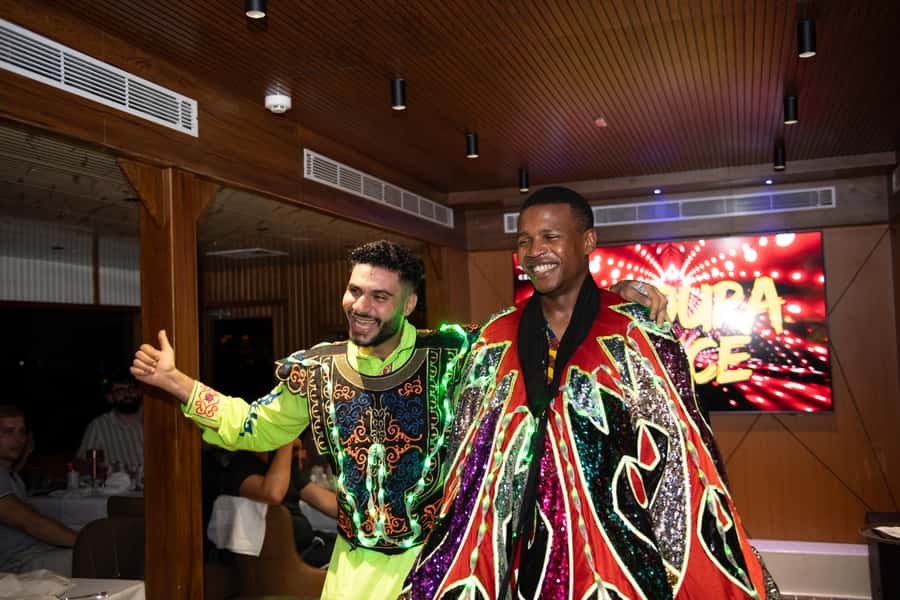 Dubai Marina: Luxury Dinner Cruise, Live Show, Open Bar & DJ - Upper deck views versus indoor comfort