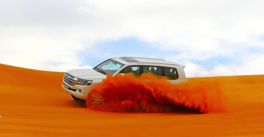 Dubai: Tour with BBQ Dinner, Camel Ride, & Traditional Show - A desert evening without the usual rush