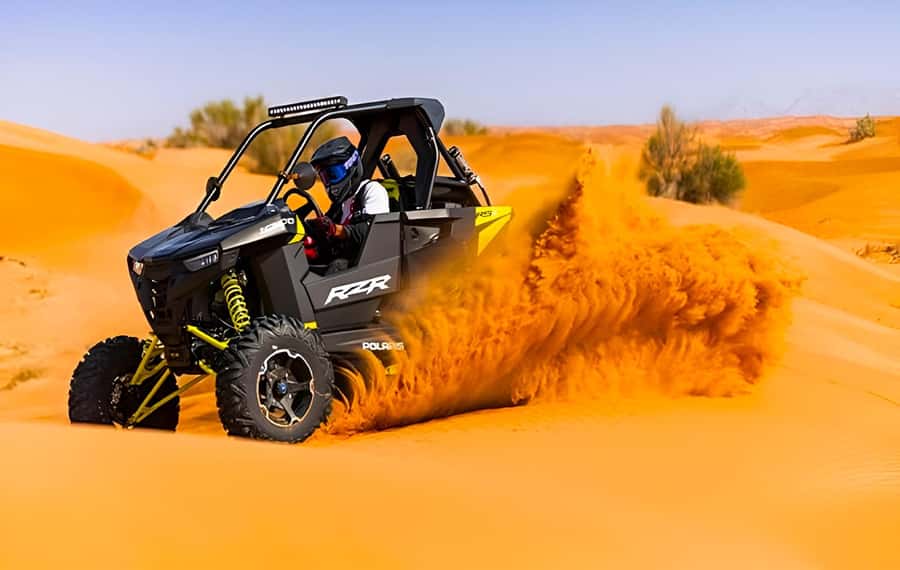 Dubai: Tour with BBQ Dinner, Camel Ride, & Traditional Show - Entering the camp at Al Aweer