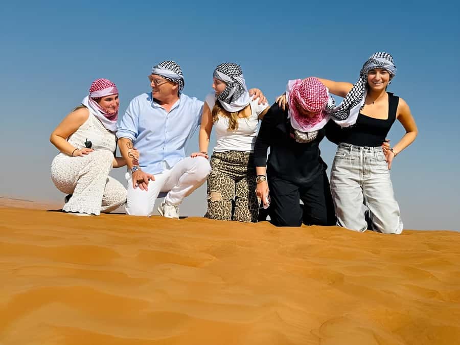 Dubai: Tour with BBQ Dinner, Camel Ride, & Traditional Show - Quad biking and other paid extras