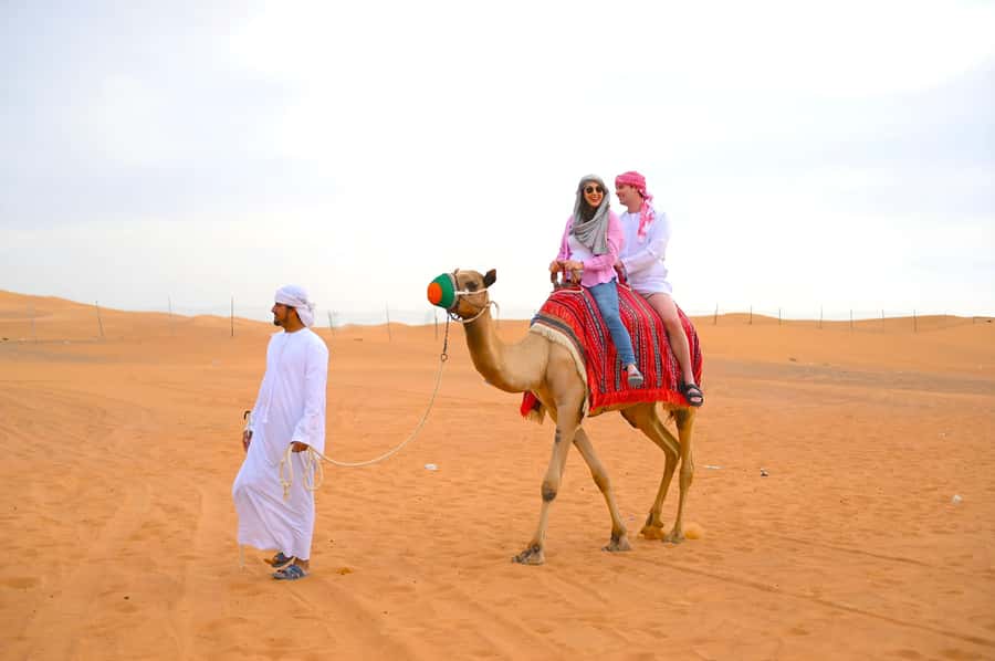 Dubai: Tour with BBQ Dinner, Camel Ride, & Traditional Show - Pickup from Dubai and the ride to Al Aweer