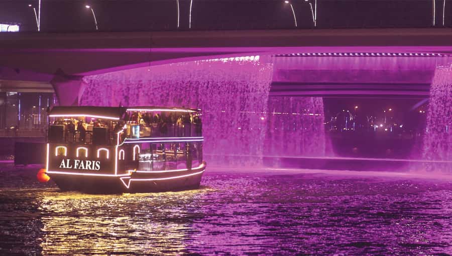 Dubai: Water Canal Cruise and La Perle Show with Dinner - Dinner with skyline views and saxophone music