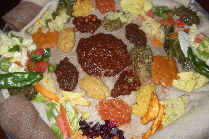 Ethiopian Cultural Dinner in Addis Ababa with LIVE Traditional Dance Show - Eating injera with your hands