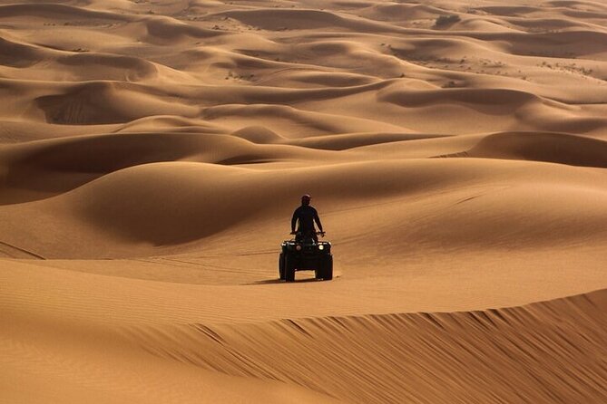 Evening Desert Safari Abu Dhabi with BBQ Dinner & Shows - Dune bashing in a 4x4 Land Cruiser