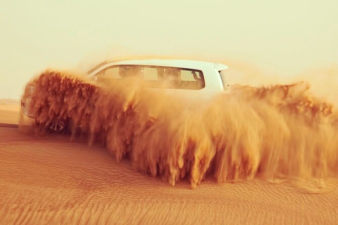 Evening Desert Safari Dubai with BBQ Dinner & Shows - Belly dancing, Tanura, and the fire show