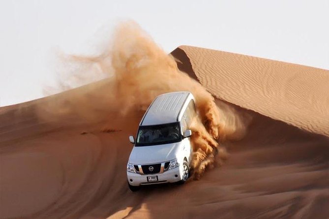 Evening Desert Safari Dubai with Belly Dance - Sunset photos and a short list of desert activities