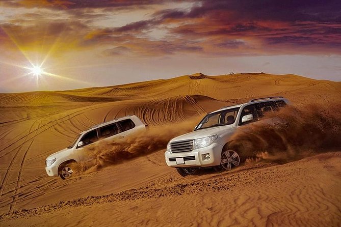 Evening Desert Safari with Belly Dance and BBQ Dinner and Camel Ride - Dune bashing in a Toyota Land Cruiser