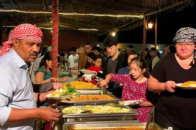 Evening Dubai Desert Safari Experience with Dinner and Shows - Dinner with barbecue and a broad buffet