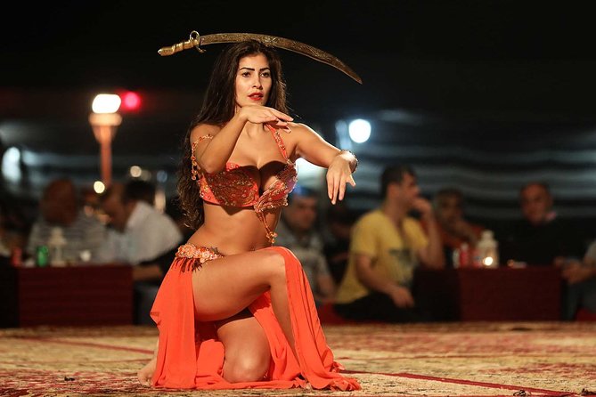 Evening Dubai Safari with BBQ, Dance Shows & Quad Biking optional - The camp: camel ride, henna, coffee, and falcon photos