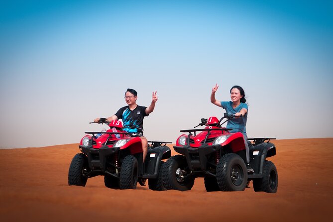 Evening Quad Bike, Desert Safari in Dubai , BBQ Dinner and Shows - Quad biking in a fenced desert area