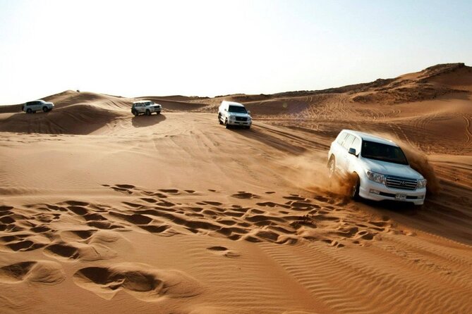 Exclusive Desert Safari with BBQ, Camel Ride & Traditional Show - Lahbab’s red dunes are the real attraction