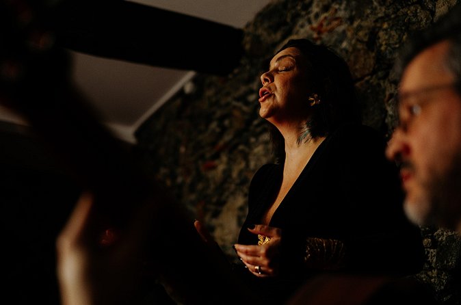 Fado Show with Wine and History in Madeira - A small room with basic seating