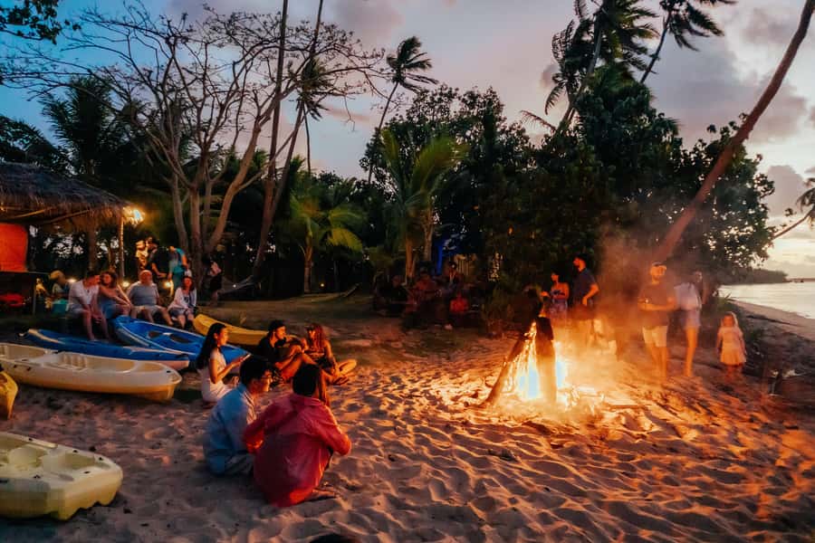 Fiji: Sunset Cruise with Dinner and Fire Show - Watching a real lovo being opened